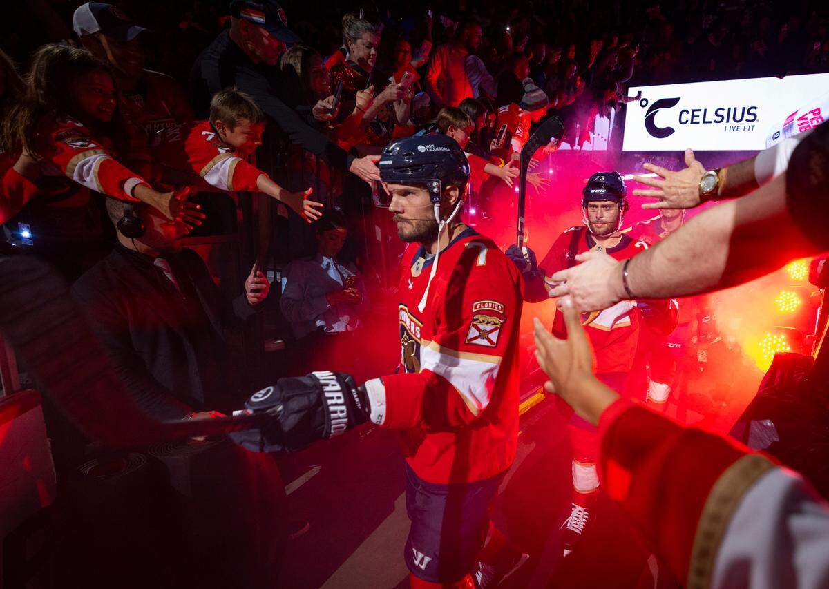 Florida Panthers defenseman Dmitry Kulikov (7) and center Carter Verhaeghe (23) walk through the tunnel before Game 4 during the Eastern Conference final of the NHL Stanley Cup playoffs at the Amerant Bank Arena on Monday, May 26, 2025 in Sunrise, Fla.