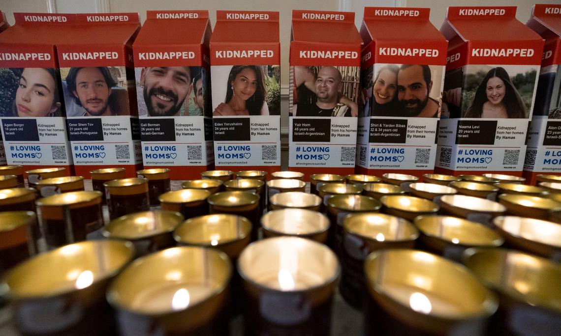 To honor the victims who lost their lives or were kidnapped in the Oct. 7 attacks in Israel by Hamas last year, candles are lit before Republican presidential candidate and former President Donald Trump hosts a remembrance event at Trump National Doral Miami on Monday, Oct. 7, 2024, in Doral, Fla.