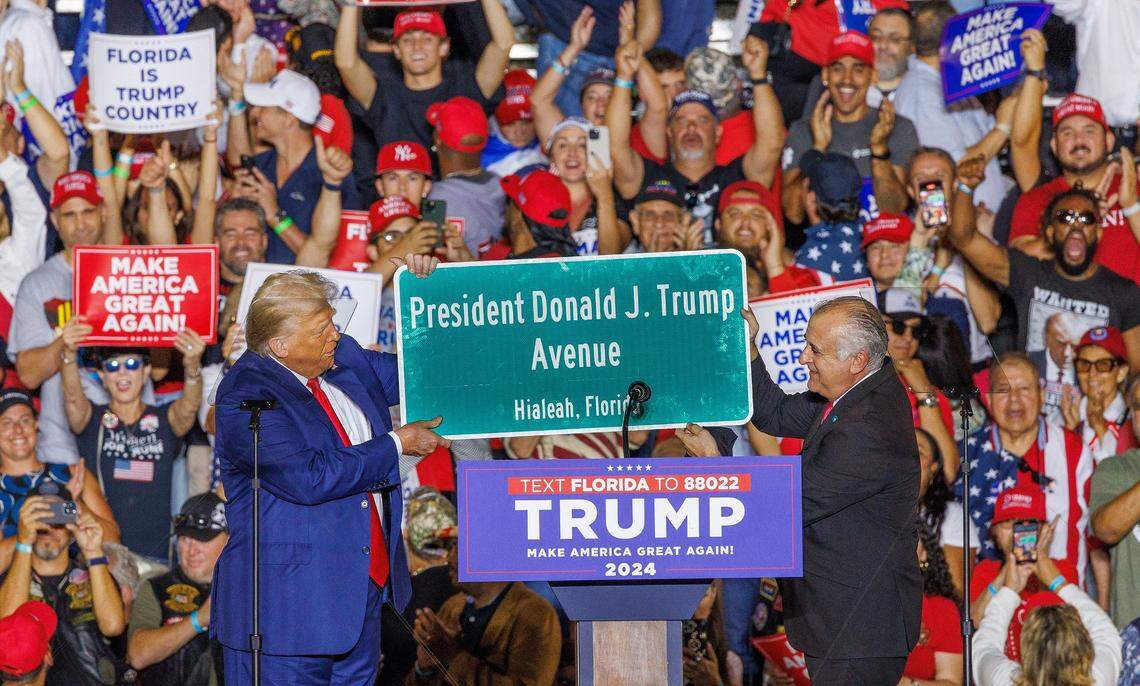 City of Hialeah Mayor Esteban Bovo, Jr. presented a street sign bearing the name of former President Donald Trump after his announcement of his proposal to the city council to named a Hialeah street in his name during a full house rally at the Ted Hendricks Stadium at Henry Milander Park in Hialeah, on Wednesday, November 08, 2023.