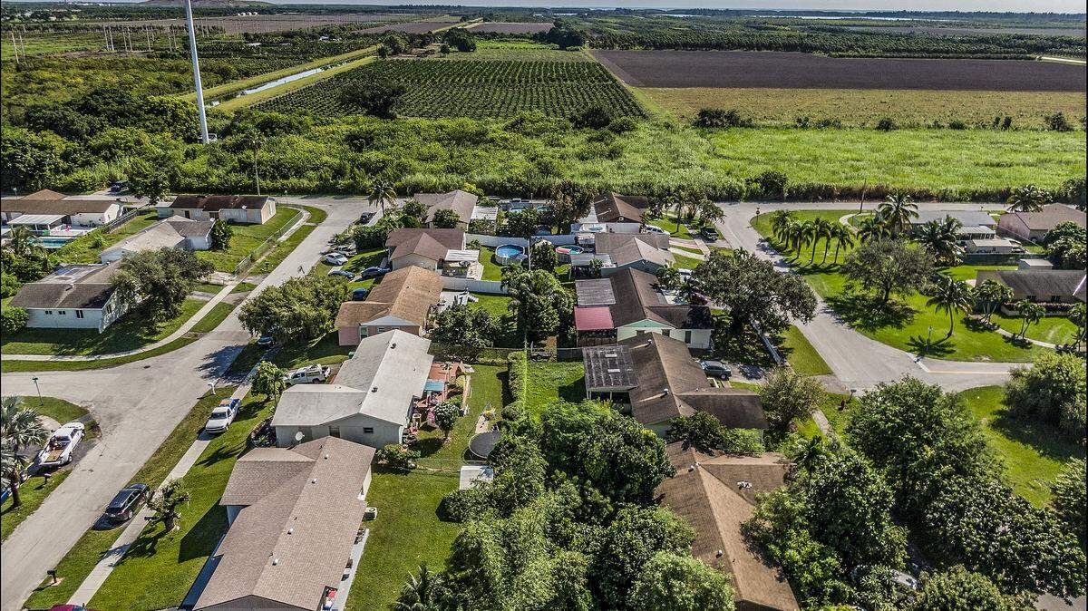 View of a neighborhood next to an extended farm fields located at 26100 SW 112th Ave., Homestead, that was included in a plan to expand the Urban Development Boundary in 2021.