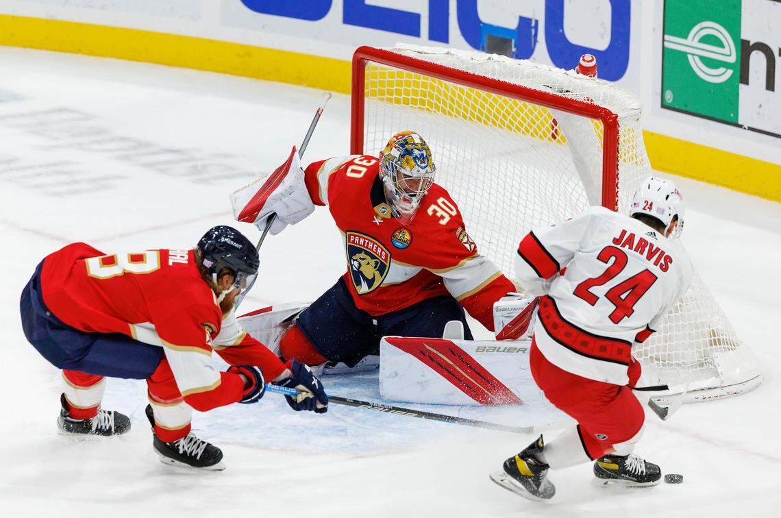 Florida Panthers goaltender Spencer Knight (30) and Panthers defenseman Marc Staal (18) defend the goal from Carolina Hurricanes center Seth Jarvis (24) during the third period of an NHL game at FLA Live Arena on Wednesday, November 9, 2022 in Sunrise, Fl.