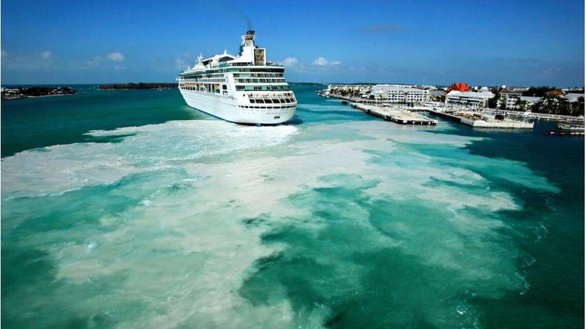 A Norwegian cruise ship churns up sediment as it motors into Key West Harbor.