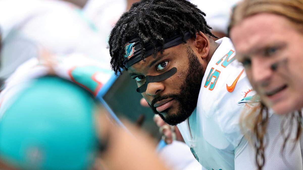 Miami Dolphins outside linebacker Elandon Roberts (52) looks on during first quarter of an NFL football game against the Buffalo Bills at Hard Rock Stadium on Sunday, September 19, 2021 in Miami Gardens, Florida.