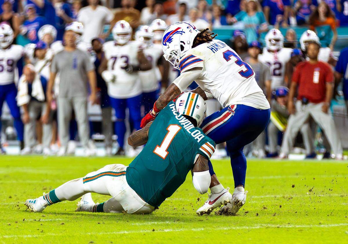 Miami Dolphins quarterback Tua Tagovailoa (1) suffers a concussion after a play against the Buffalo Bills in the second half of their NFL game at Hard Rock Stadium on Thursday, Sept. 12, 2024, in Miami Gardens, Fla.