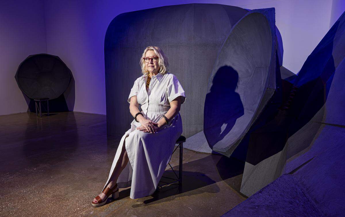 ‘We certainly would not have the robust cultural community that we have without the investment that the county has made,’ said Lorie Mertes, executive director at Locust Projects. She is photographed inside one of the center’s art installations, ‘Drawn Breath, Exhaled Frequencies,’ by Arsimmer McCoy, Selina Nwulu and Michael Webster.