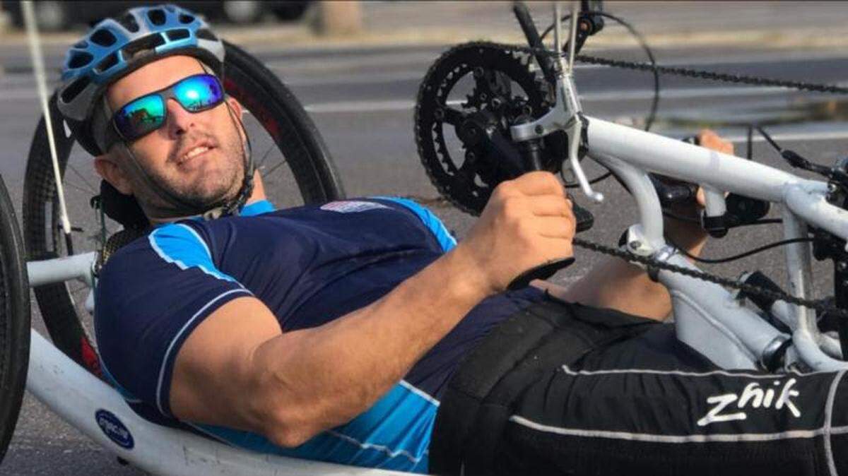 Daniel Evans, 40, was paralyzed while serving as a Marine in Brazil 20 years ago. On Sunday, Jan. 27, 2019, he will participate in the Fitbit Miami Marathon.