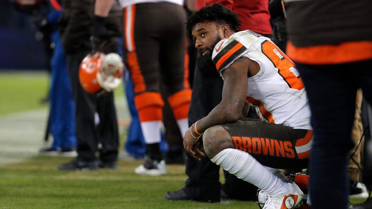 Cleveland Browns wide receiver Jarvis Landry watches the final moments of an NFL football game against the Baltimore Ravens, Sunday, Dec. 30, 2018, in Baltimore. (AP Photo/Carolyn Kaster)