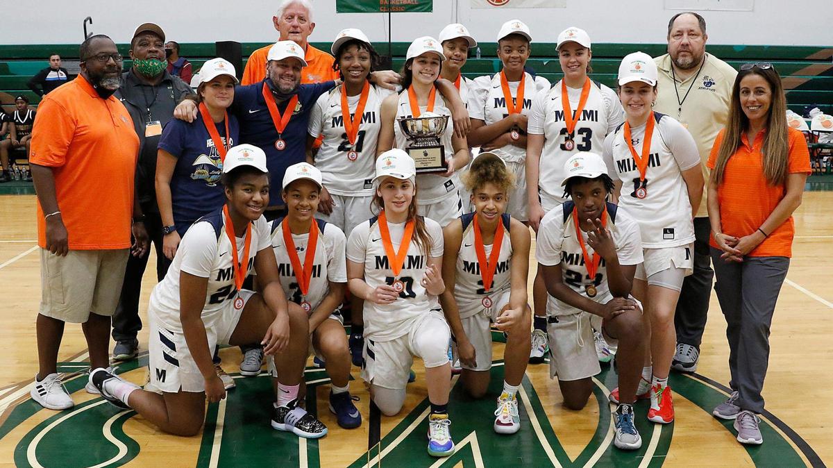 Miami High Stingarees pose after winning the 27th-annual Junior Orange Bowl Girls’ Basketball Classic final game against FSU High on Thursday.