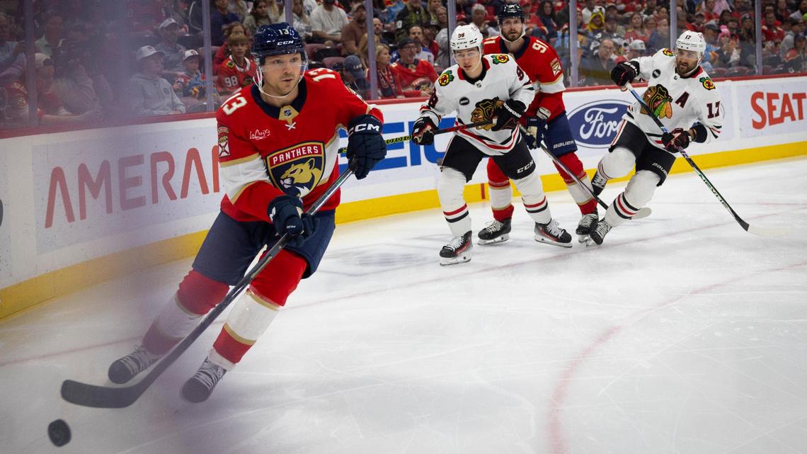 Florida Panthers center Sam Reinhart (13) looks for an open teammate during the first period of an NHL game against the Chicago Blackhawks at the Amerant Bank Arena on Sunday, Nov 12, 2023, in Sunrise, Fla.