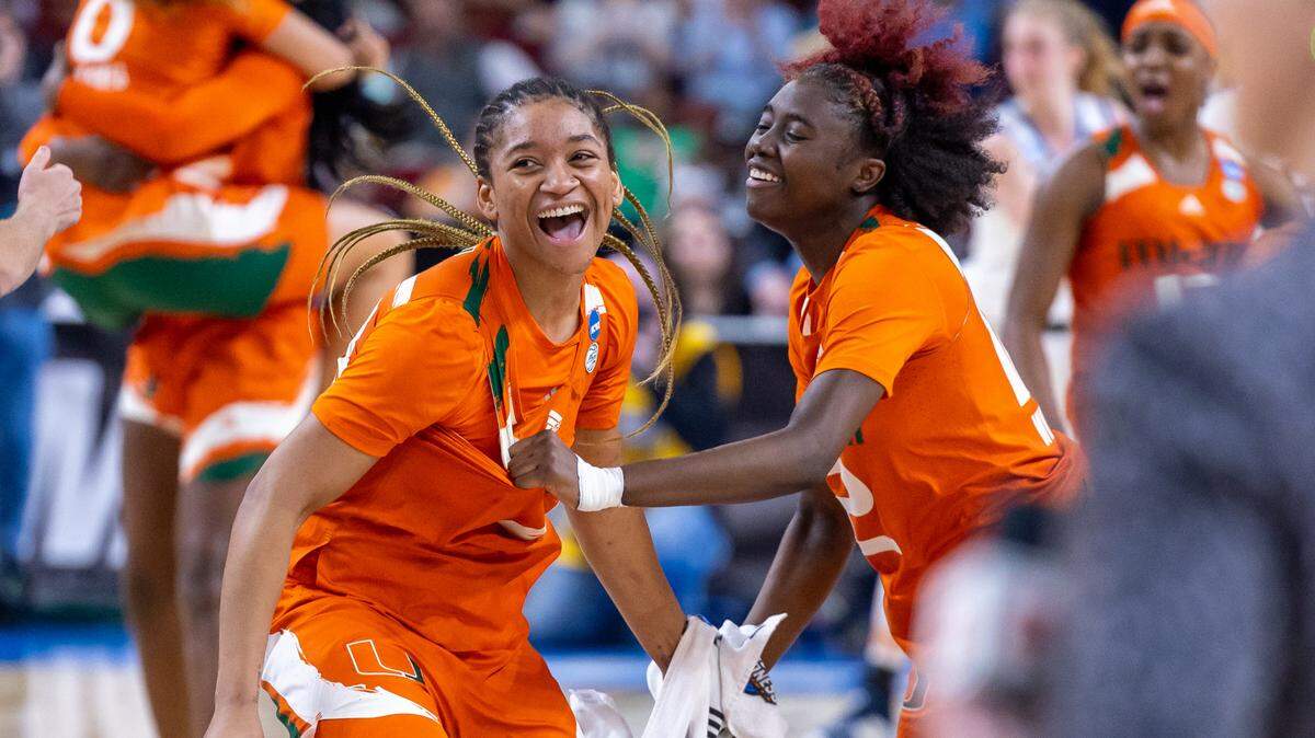 Jasmyne Roberts and Ja’Leah Williams celebrate after defeating Villanova to advance to the Elite Eight on Friday, Mar. 24 in the Bon Secours Arena.