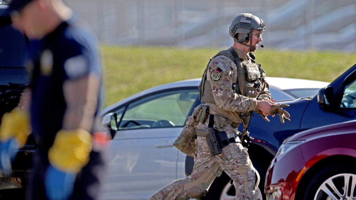 A law enforcement officer is deployed at Parkland’s Marjory Stoneman Douglas High School, where 17 students and educators were shot to death on Feb. 14, 2018.