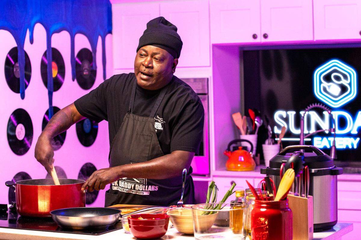 Trick Daddy, co-host of YouTube cooking series ‘I Got My Pots’, cooks during an episode recording at a studio in Oakland Park, Florida, on Wednesday, April 19, 2022.