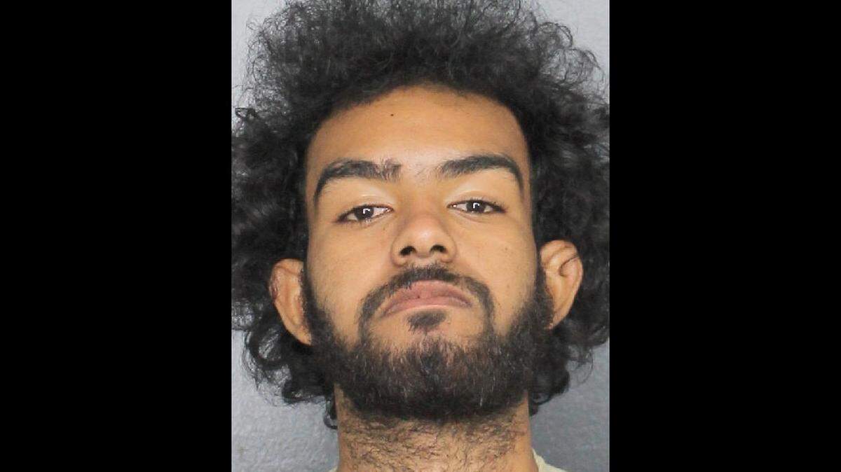 Najay Jackson, 19, texted a man he was going to kill him and then later shot him because he thought he was placed under a voodoo curse, Miramar police said. Three schools were placed on lockdown because of the shooting.