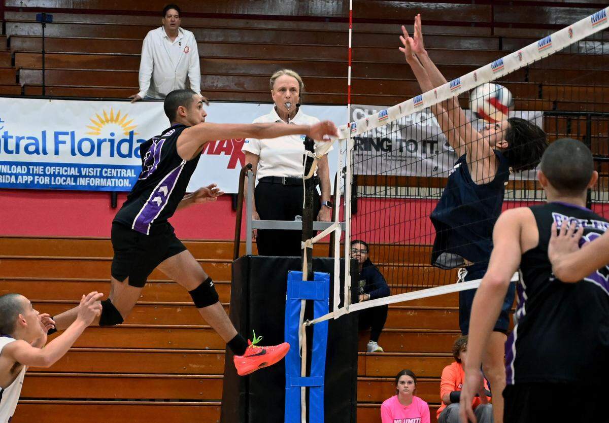 Southwest outside hitter Andrew Ovalle unleashes a hard-hitting shot while soaring high above the floor against Mater Lakes in an FHSAA boys’ volleyball state quarterfinals game Friday at Polk State College in Winter Haven, Fla.