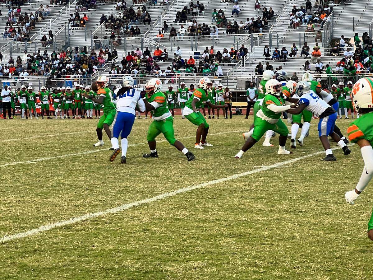 Blanche Ely sophomore quarterback Gary Hadley Jr (No. 16 far left) threw for 105 yards and a pair of touchdowns to lead the Tigers to a 33-28 victory over Dillard in the annual Soul Bowl on Friday at Ely.