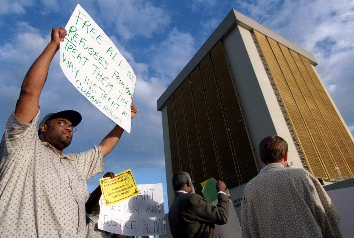 In 2002, protesters gather outside the INS building in Miami.