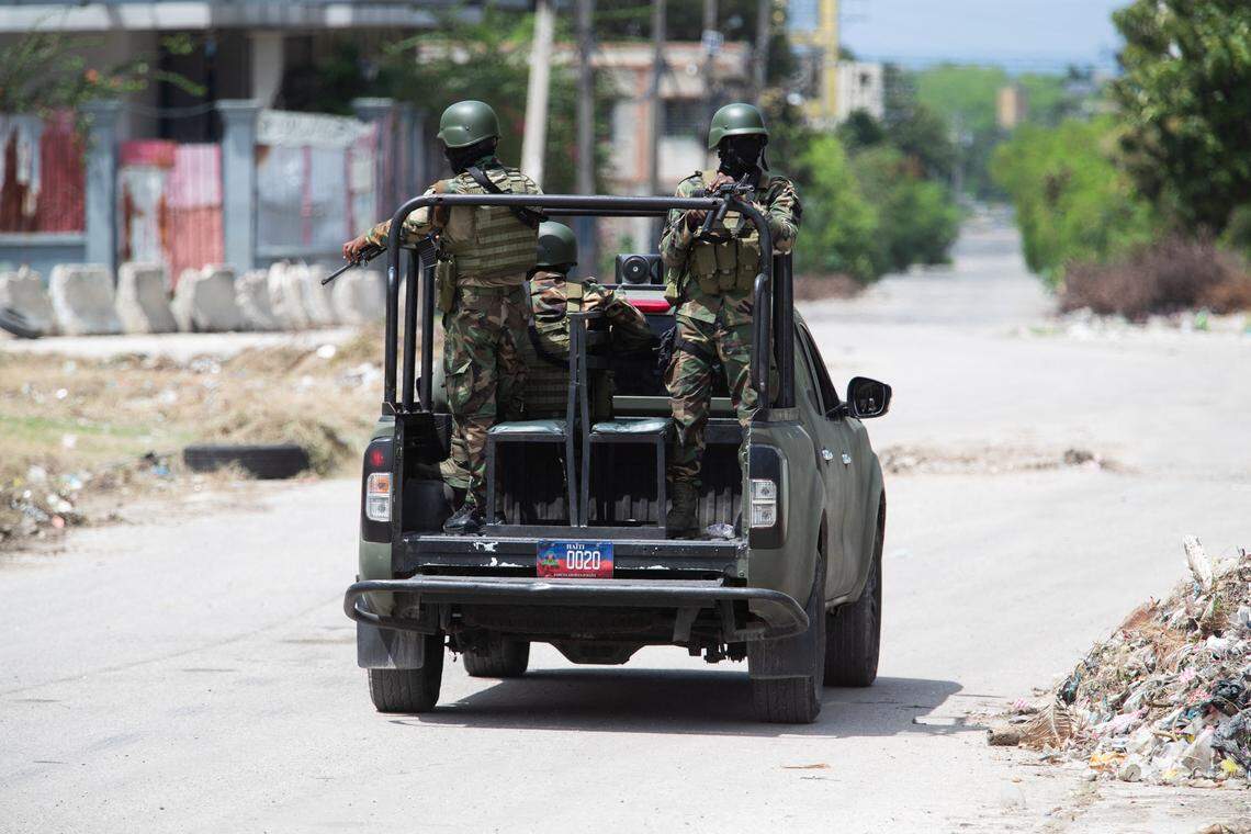 Haitian army forces (FADH) patrol the city center near the National Palace, in Port-au-Prince, Haiti on October 1, 2025. The United Nations Security Council on September 30, 2025, adopted a resolution to transform a UN-backed security mission in gang-dominated Haiti into a larger, full-fledged force with military troops. The new force can now have a maximum of 5,500 uniformed personnel, including police officers and soldiers, unlike the current mission, which is just law enforcement. (Photo by Clarens SIFFROY / AFP) (Photo by CLARENS SIFFROY/AFP via Getty Images)          