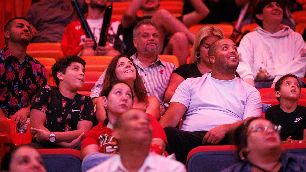 Fans watch the first draft pick, Cooper Flagg to the Dallas Mavericks, on the big screen during the Miami Heat NBA Draft party on Wednesday, June 25, 2025 at Kaseya Center in downtown Miami, Fla.
