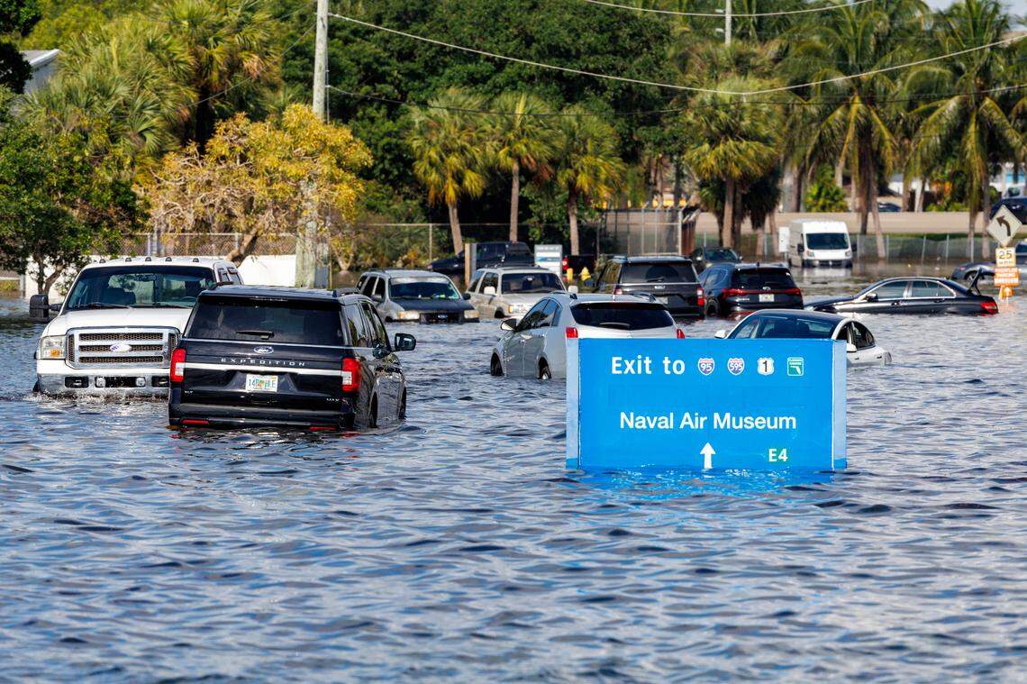 Vehicles on flooded West Perimeter Road in Fort Lauderdale on Thursday, April 13, 2023.