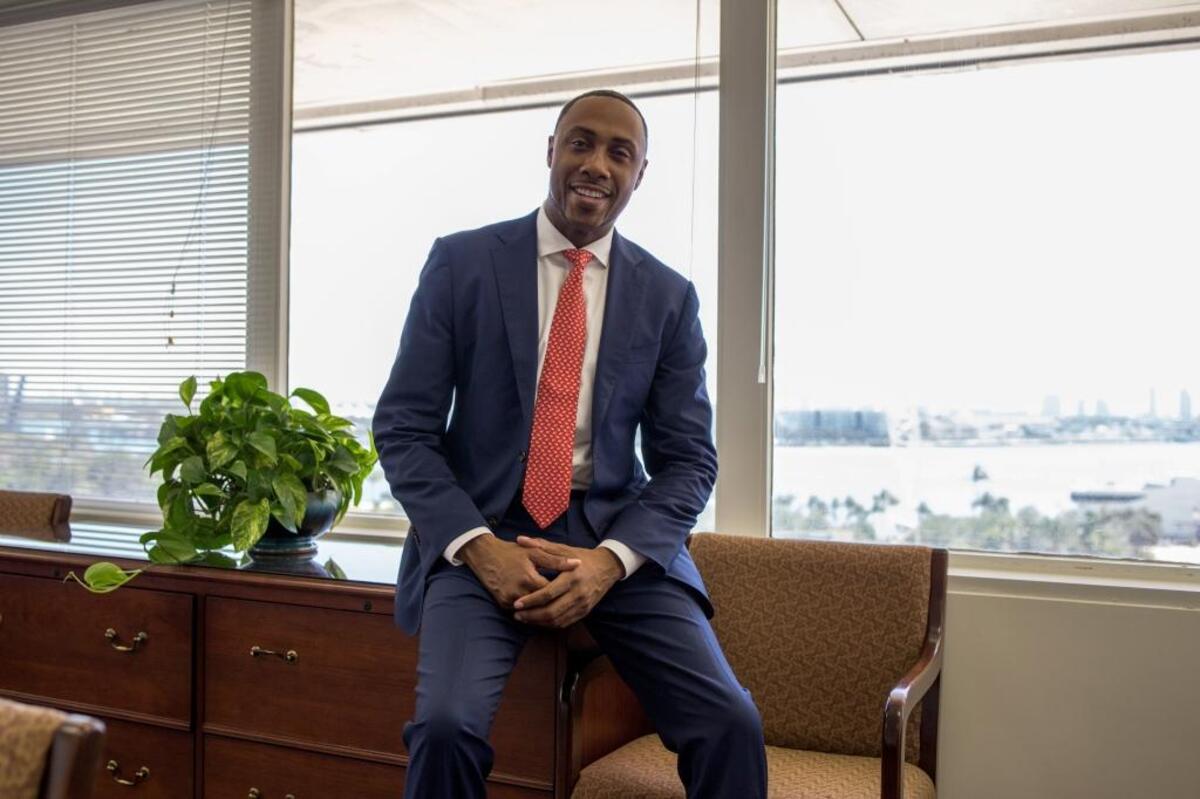 Newly selected Regional Administrator Ashely D. Bell posses in his office at South Biscayne Boulevard in Miami on April 17, 2018.