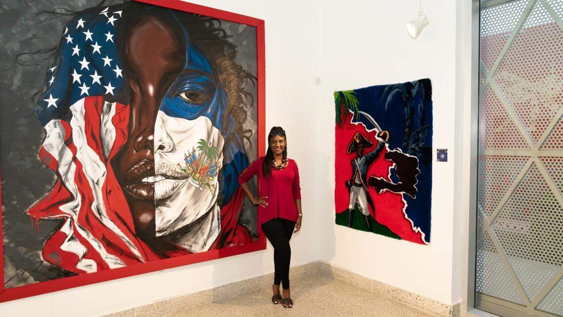 Two emblematic artworks of the “Joined at the Roots” exhibit: At left, “Haitian & Black American” by Rico Melvin Costoso Jr., and at right, “Taking Power” by Goodwin Ferrier. In the middle, author and South Florida‑based youth advocate, Shirley Plantin who introduced the exhibition last May.