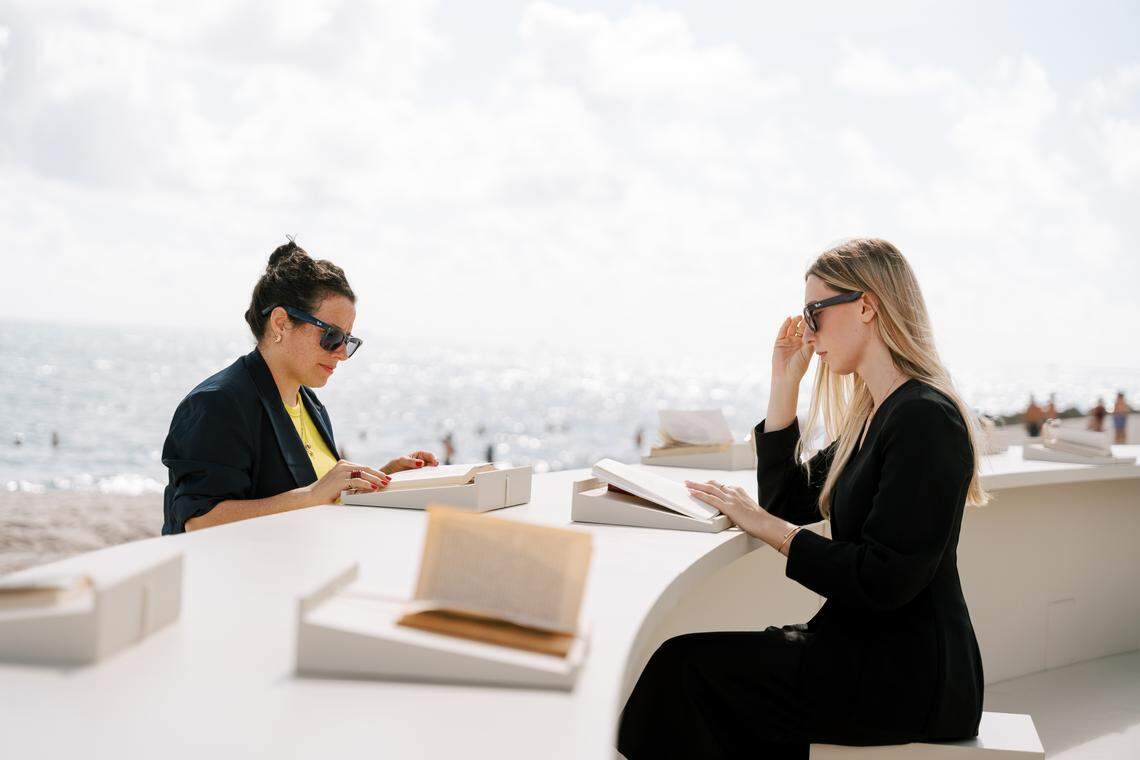 ‘Library of Us’ by Es Devlin is free and open to the public throughout Miami Art Week. Visitors are encouraged to sit and read from Devlin’s personal books.