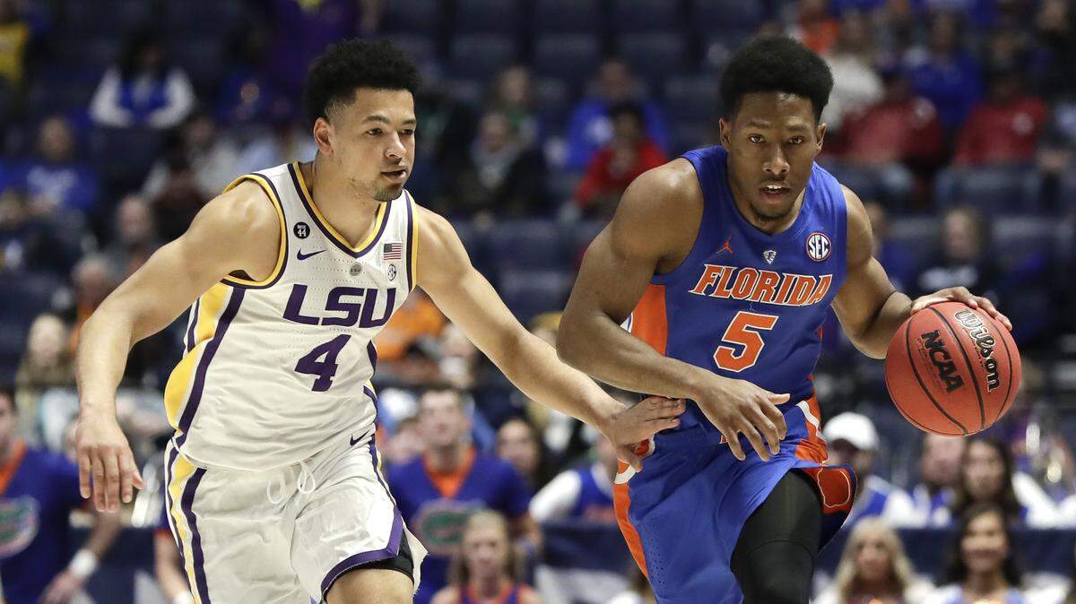Florida guard KeVaughn Allen (5) drives against LSU guard Skylar Mays (4) in the first half of an NCAA college basketball game at the Southeastern Conference tournament Friday, March 15, 2019, in Nashville, Tenn.