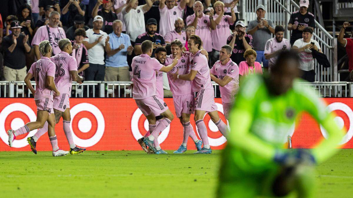 Inter Miami midfielder Robert Taylor (16) celebrates with his teammates after scoring a goal against Philadelphia Union during the second half of an MLS game at DRV PNK Stadium on Saturday, March 4, 2023, in Fort Lauderdale, Fla.