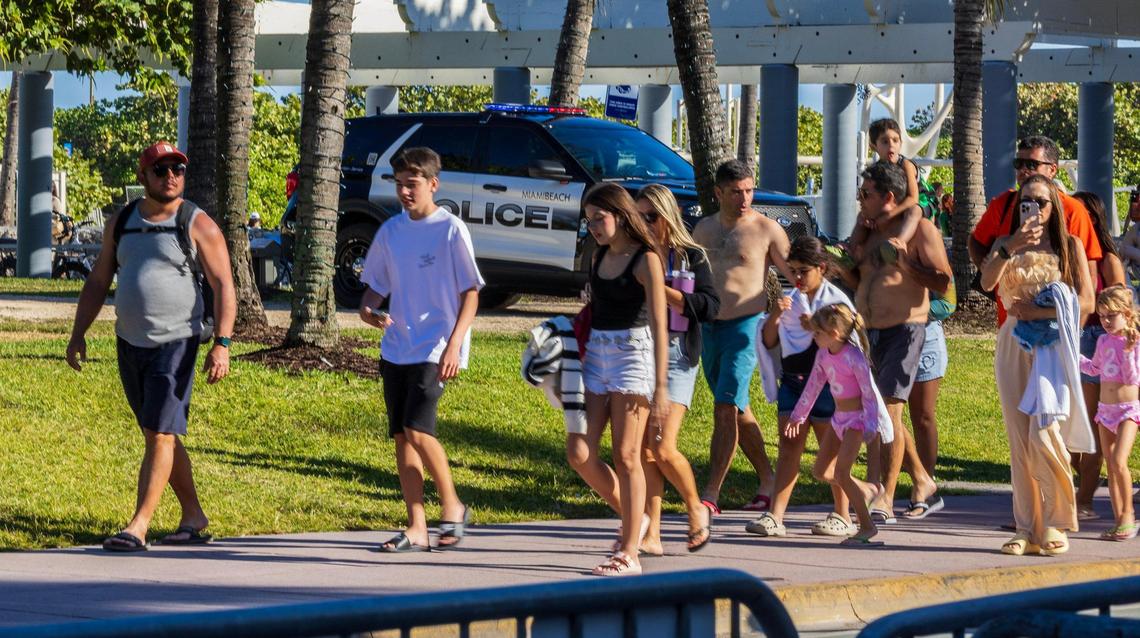 People make their way up Ocean Drive during spring break in Miami Beach, Florida, on Friday, March 21, 2025.