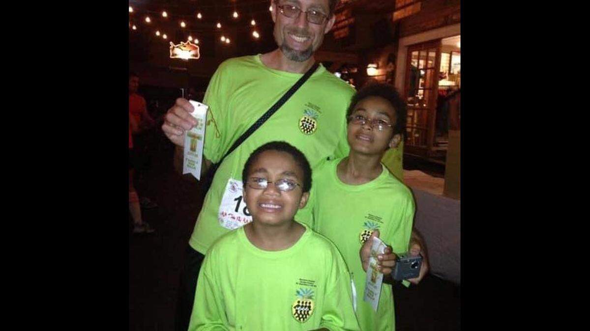 Ariel Poholek and his sons, Pascal and Daniel, are shown in this undated photo.