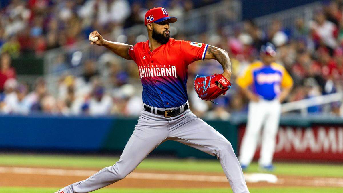 Dominican Republic pitcher Sandy Alcantara (20) throws the ball during the first inning of a 2023 World Baseball Classic game against Venezuela at loanDepot Park in Miami, Florida, on Saturday, March 11, 2023.
