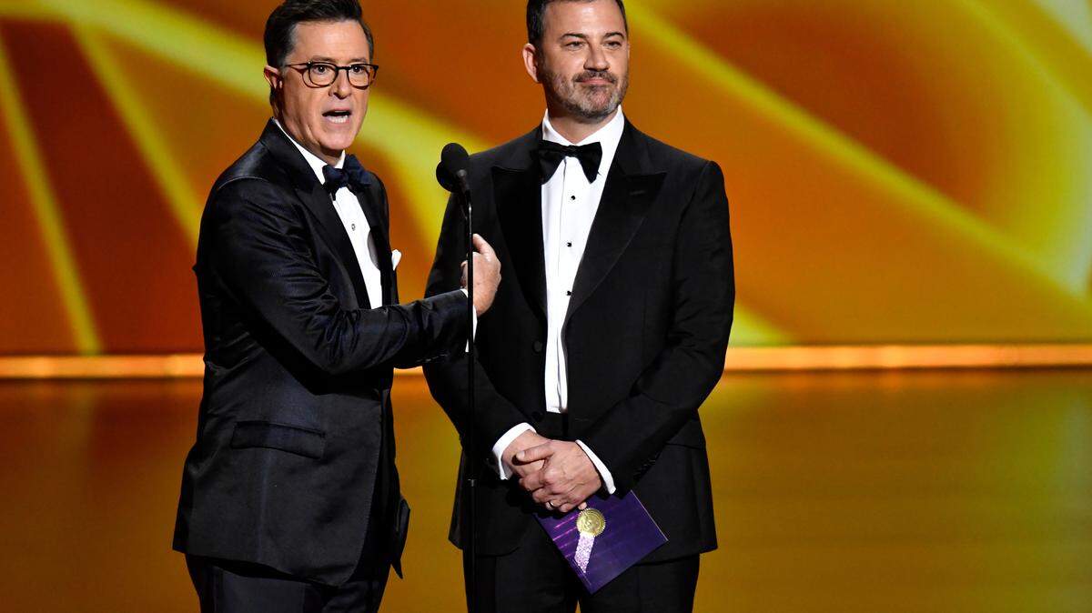 Stephen Colbert (L) and Jimmy Kimmel  during the 71st Emmy Awards in 2019.