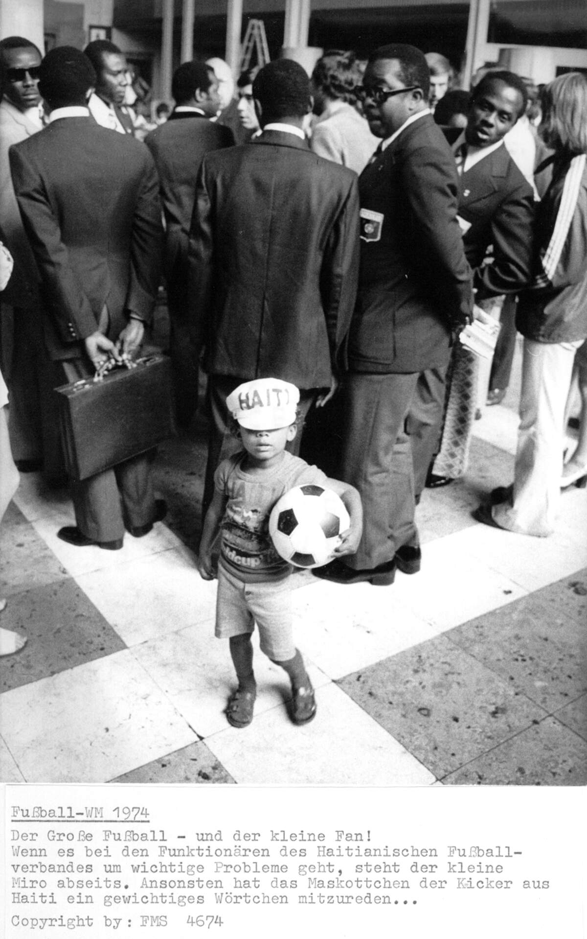 Miro Magloire, 3 1/2 years old at the time, had no idea why photographers were paying attention to him as Haiti’s 1974 World Cup team arrived in West Germany. He became the team’s unofficial mascot and is today an acclaimed choreographer in New York.