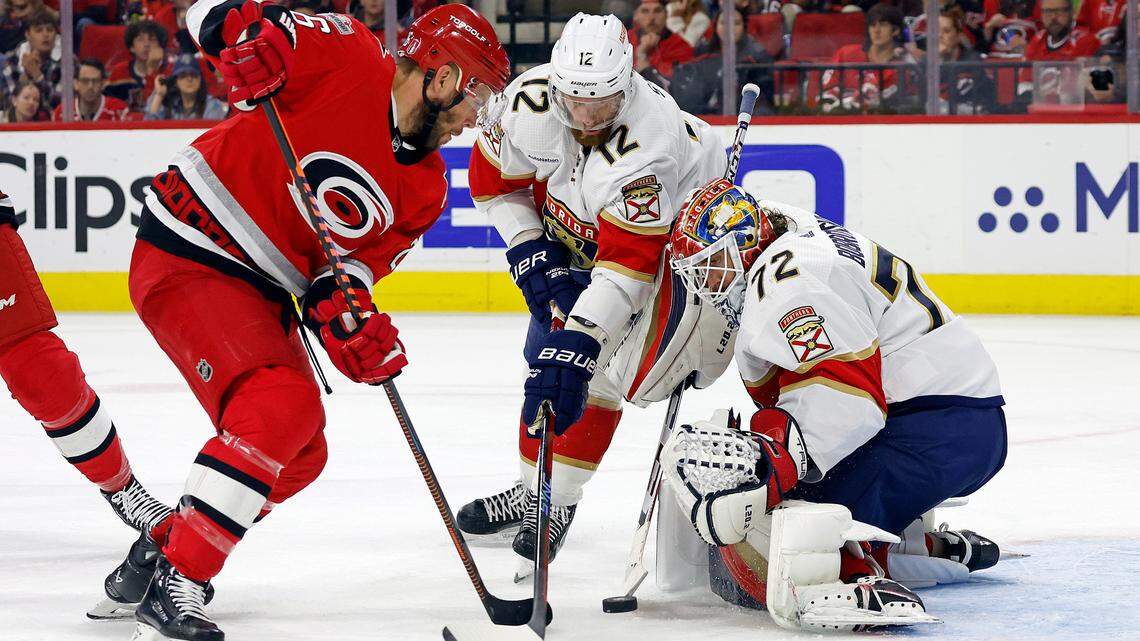 Carolina Hurricanes’ Paul Stastny (26) shoots the puck Florida Panthers goaltender Sergei Bobrovsky (72) with Eric Staal (12) joining in during the second period of Game 2 of the NHL hockey Stanley Cup Eastern Conference finals in Raleigh, N.C., Saturday, May 20, 2023. (AP Photo/Karl B DeBlaker)