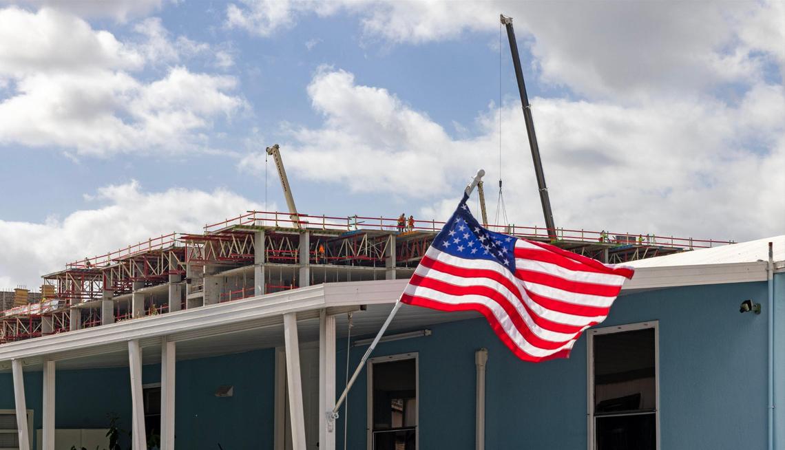The partially-complete Li’l Abner III development towers over the roofs of the mobile home park on Thursday, November 14, 2024.