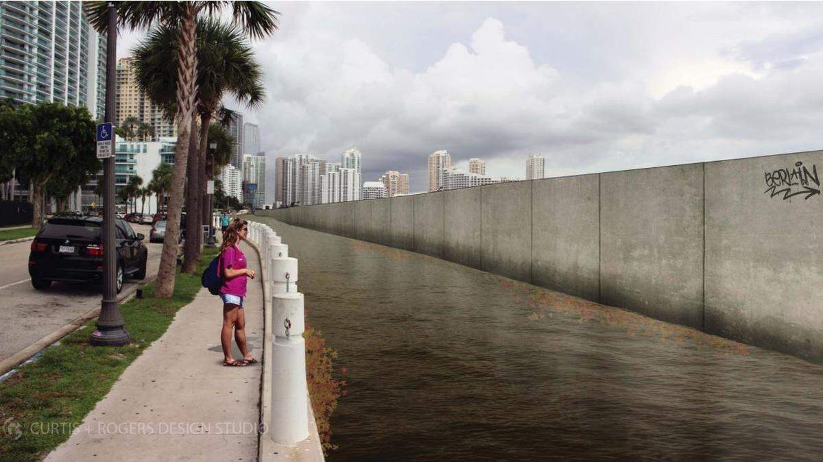 Una representación de lo que el Cuerpo de Ingenieros del Ejército había propuesto para proteger el downtown de Miami de las inundaciones por tormentas en Brickell Bay Drive. El plan de protección se está  modificando, comenzando con nuevos esfuerzos esta semana para recopilar la opinión del público.