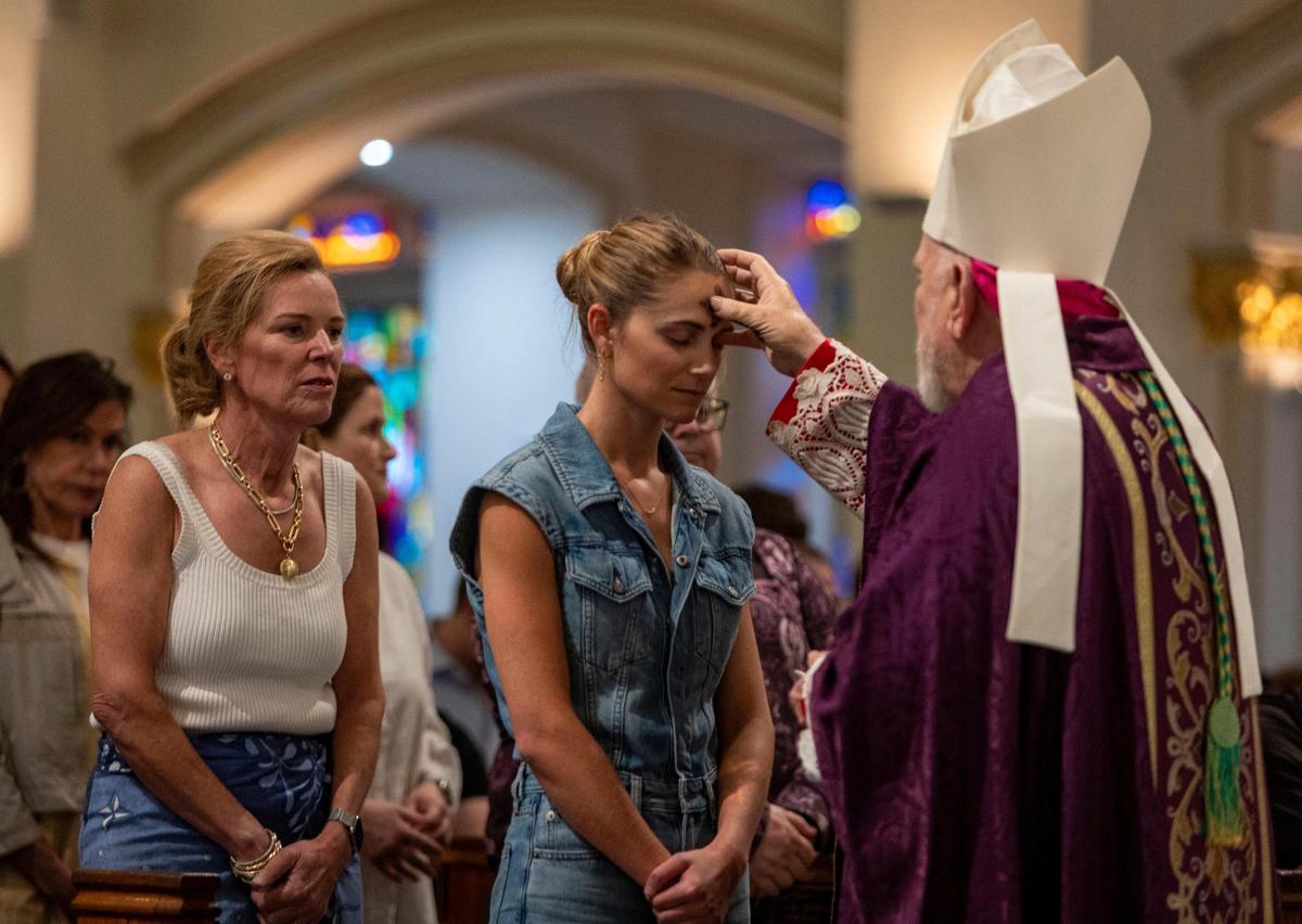 Fort Lauderdale, FL- March 5, 2025 - Archbishop Thomas Wenski applies Ashes to the faithful as he celebrates mass at St. Anthony Church in Fort Lauderdale, Florida on the occasion of Ash Wednesday. Ash Wednesday marks the beginning of the 40-day Lenten season, a time of penance and preparation for the commemoration of the passion and death of Jesus Christ and his ultimate resurrection on Easter Sunday.