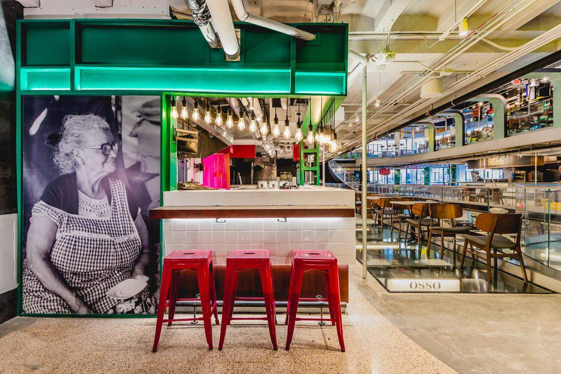 Tacotomia by Karla Hoyos at Julia & Henry’s food hall in Miami. Each vendor’s counter is designed in a unique way, and the Tacotomia booth features a photo of Hoyos’ Mexican grandmother.