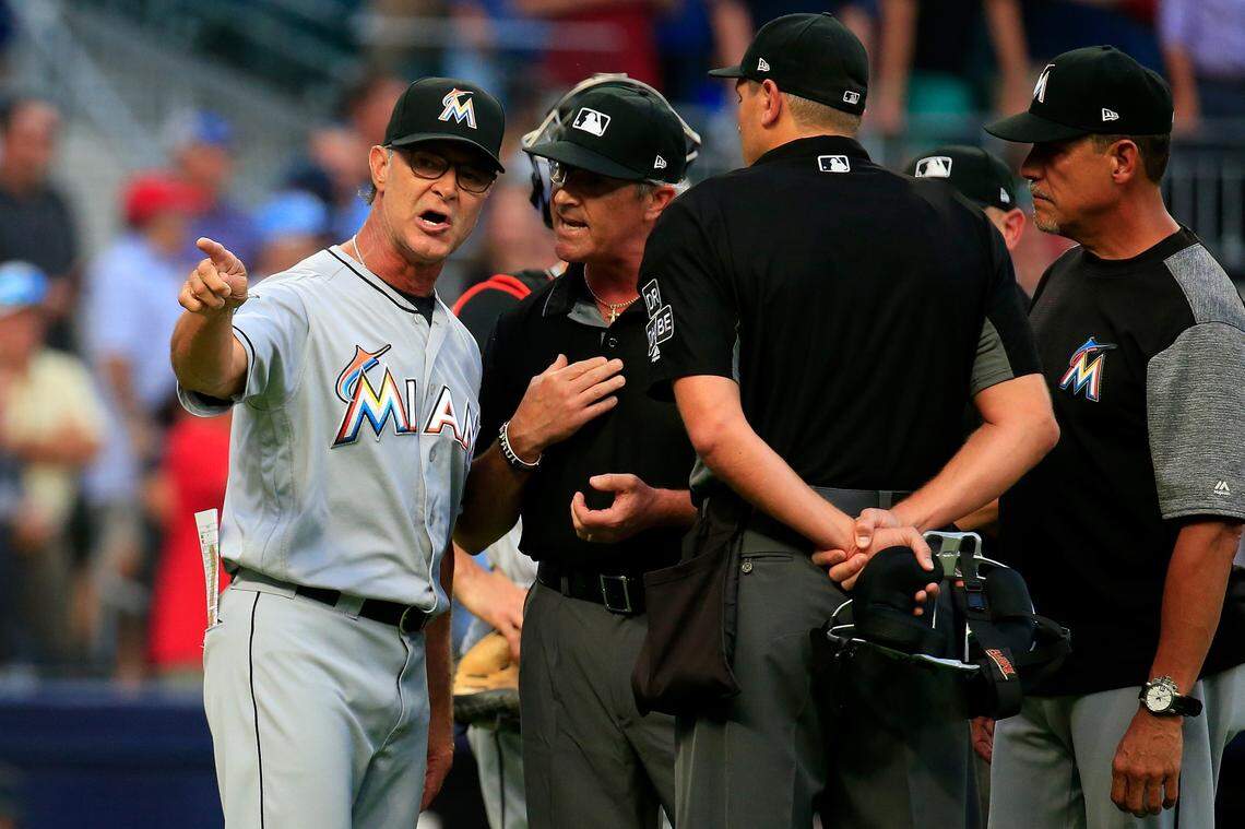 ATLANTA, GA - AUGUST 15:  Manager Don Mattingly #8 of the Miami Marlins argues with the umpires after Jose Urena was ejected during the first inning against the Atlanta Braves at SunTrust Park on August 15, 2018 in Atlanta, Georgia. (Photo by Daniel Shirey/Getty Images)