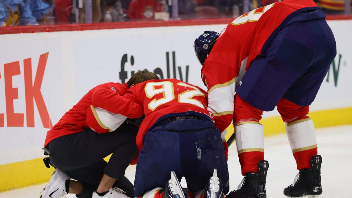 Florida Panthers left wing Tomas Nosek (92) is checked on by a trainer after a collision against the boards during the first period of an NHL preseason game against the Nashville Predators at Amerant Bank Arena in Sunrise, Florida, on Sunday, September 22, 2024.