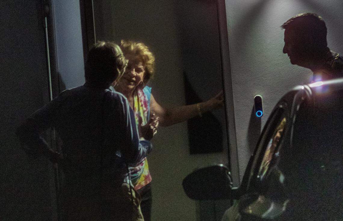 View Miami Herald reporter Linda Robertson attempting to speak to DCF employee Tania Hernandez, outside of her house, located at 131 Flagami Boulevard, in Miami, on Thursday, February 19, 2026.