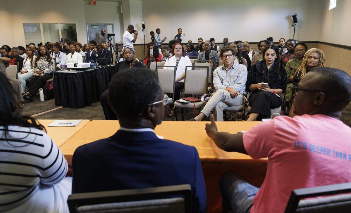 Conference attendees listen to a panel during the Influence That Moves Communities session at the Teach to Fish Business Summit, on Tuesday, Oct. 14, 2025, at the Kovens Conference Center in North Miami, Fla.