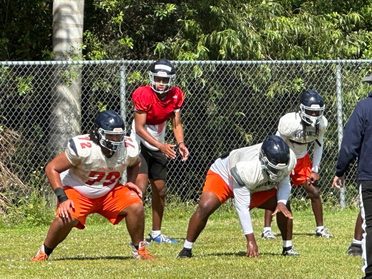 Homestead quarterback Malachi “Bubba” Lewis calls a play during an offseason practice for the Broncos, who started fall practice on Monday.