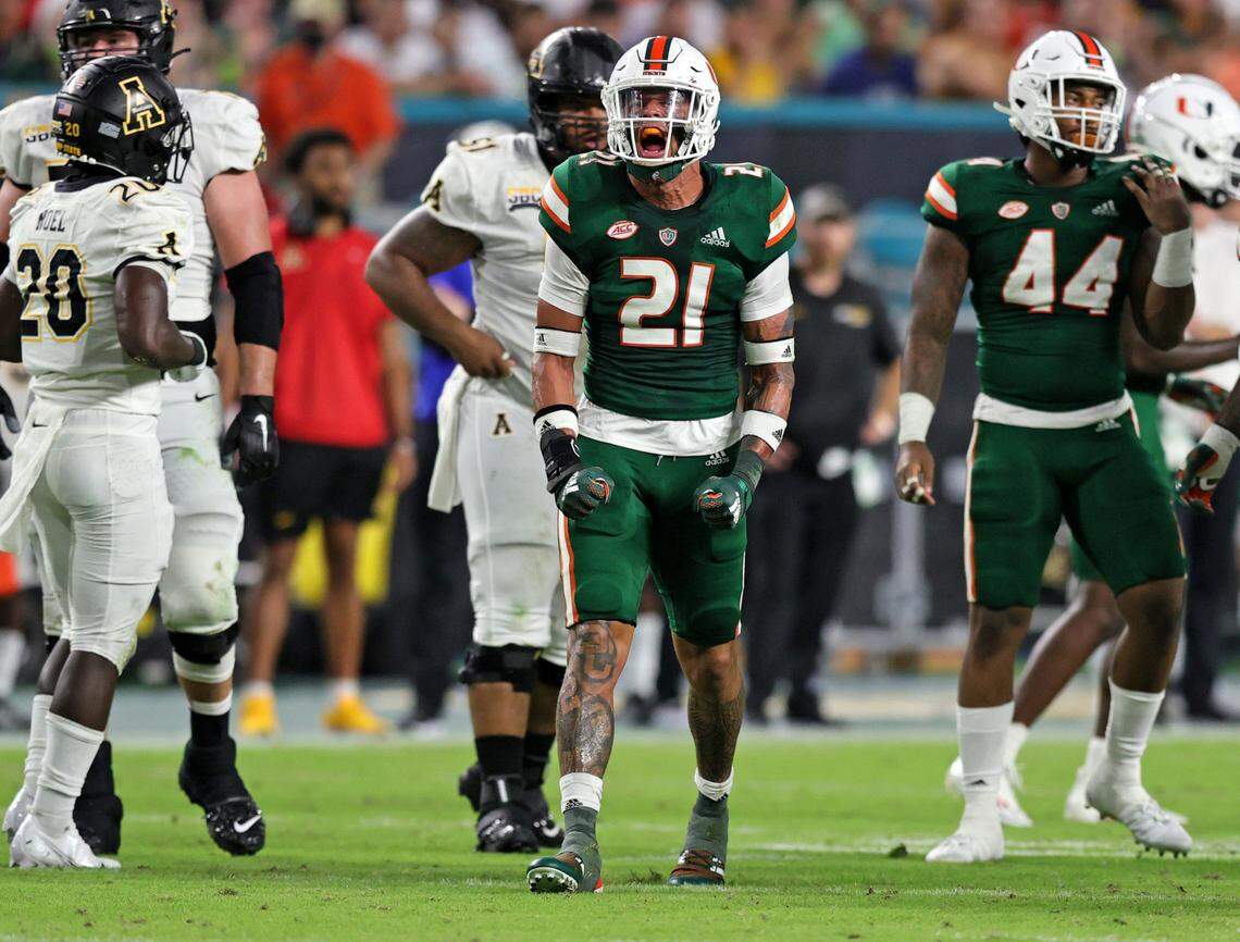 Miami Hurricanes safety Bubba Bolden (21) reacts after a play during the first quarter of their ACC football game against the Appalachian State Mountaineers at Hard Rock Stadium on Saturday, September 11, 2021 in Miami Gardens, Florida.