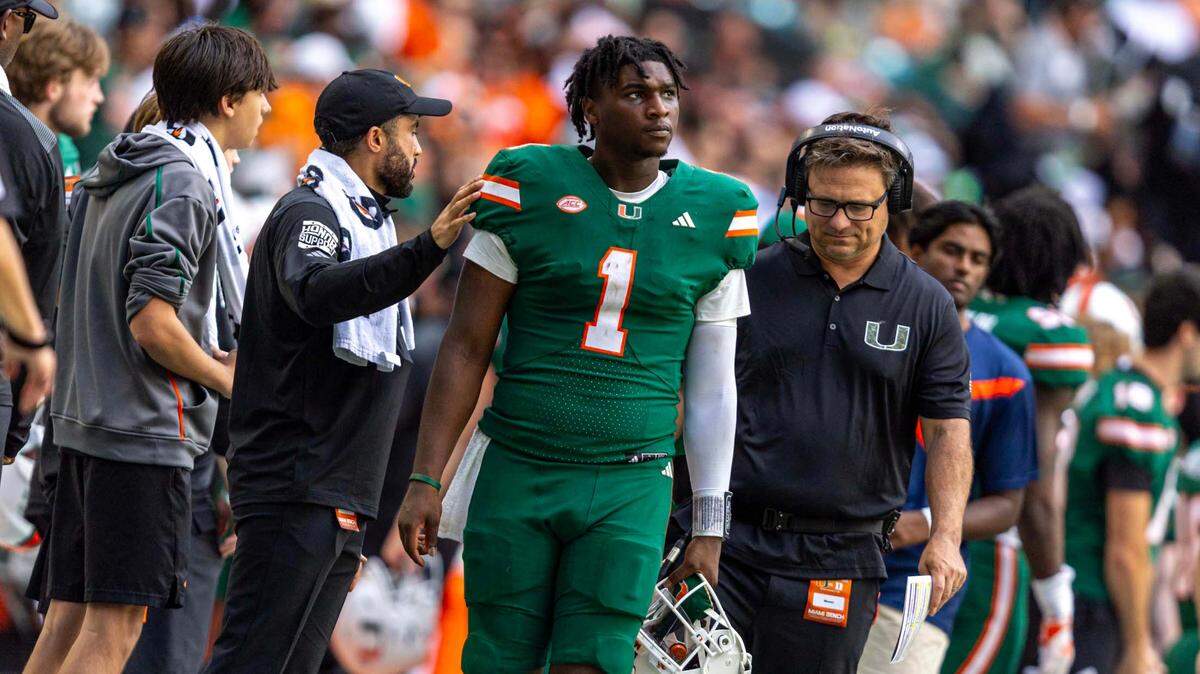 Miami Hurricanes quarterback Cam Ward (1) reacts on the sideline during the second half of an ACC football game against the Duke Blue Devils at Hard Rock Stadium on Saturday, Nov. 2, 2024, in Miami Gardens, Fla.