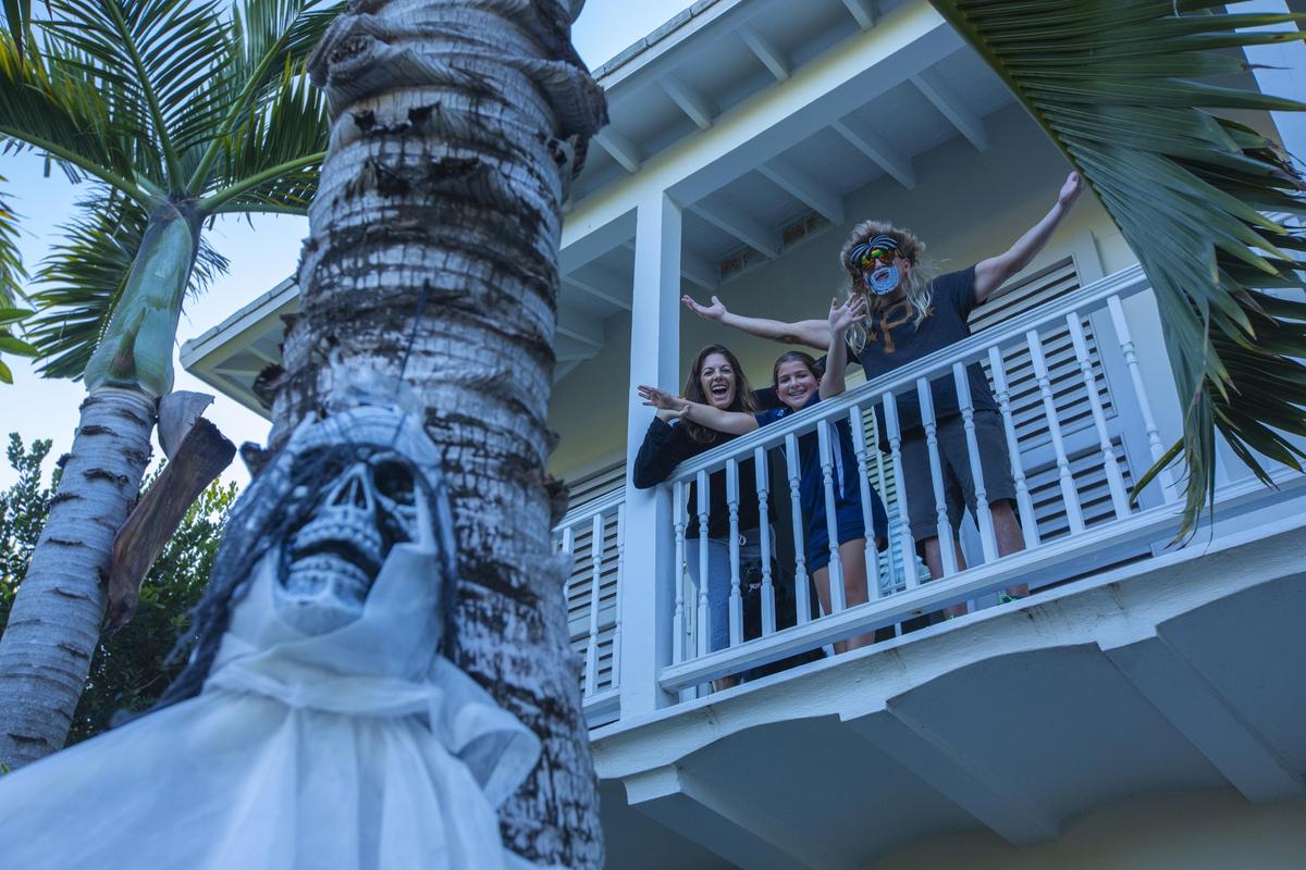 Rachel Poses, Lily Poses, 10, and Eric Poses at their home in Lakeview, a neighborhood well known for its Halloween celebration, on Monday, Oct. 29, 2018.