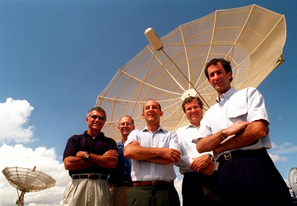 National Hurricane Center hurricane forecasters, from left, Miles Lawrence, Max Mayfield, Lixion Avila, Richard Pasch and Ed Rappaport, at the new center at Florida International University on May 25, 1995.
