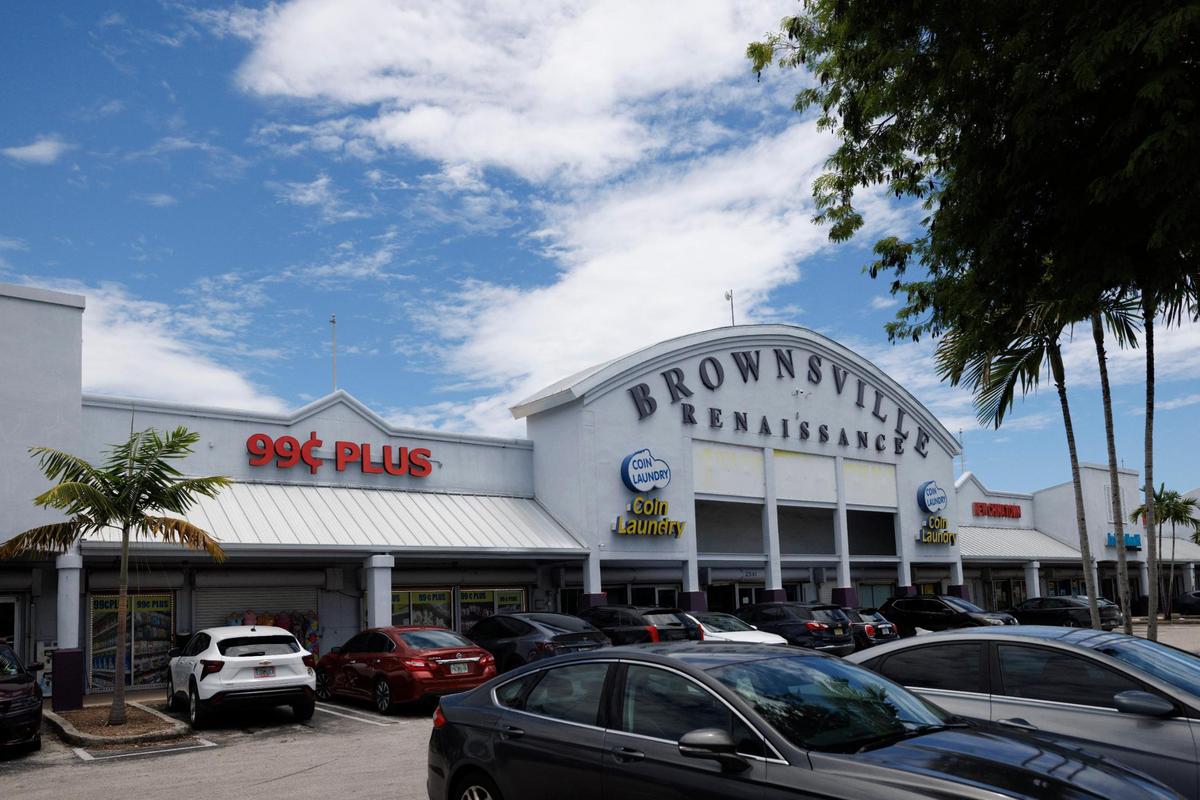 The only shopping plaza in the neighborhood sits during the day on Wednesday, July 23, 2025 in the Brownsville neighborhood of Miami, Fla. The Brownsville neighborhood, however, does not have their own grocery store — only small food markets.