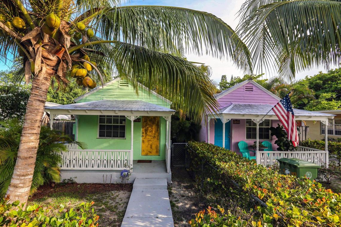 A pair of century-old wood-frame cottages still stand in Miami’s historically Black West Coconut Grove on Thursday, June 16, 2022. The mostly low-income community is disappearing amid accelerating gentrification.