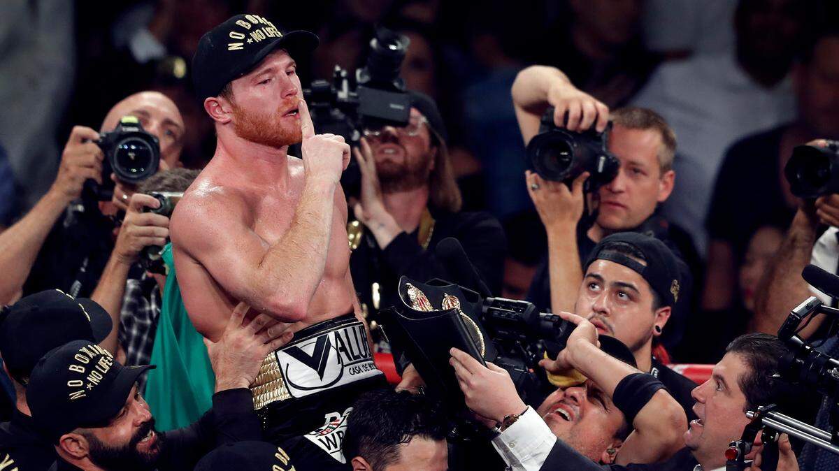 Canelo Alvarez, of Mexico, celebrates after defeating WBC/WBA middleweight champion Gennady Golovkin, of Khazakstan, in a title boxing fight at T-Mobile Arena in Las Vegas, Saturday, Sept. 15, 2018. Alvarez took Glolovkin’s WBC/WBA titles by majority decision. (Steve Marcus/Las Vegas Sun via AP)